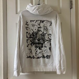 7th Day Studio Tattoo Studio- White Hoodie with Lion and Floral Design